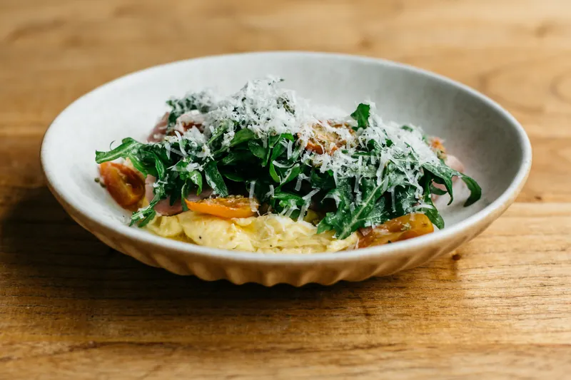 Salad of greens and shaved parmesan